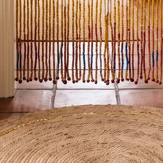 Illustration : Tapis rond en jute et fil doré, 80 cm